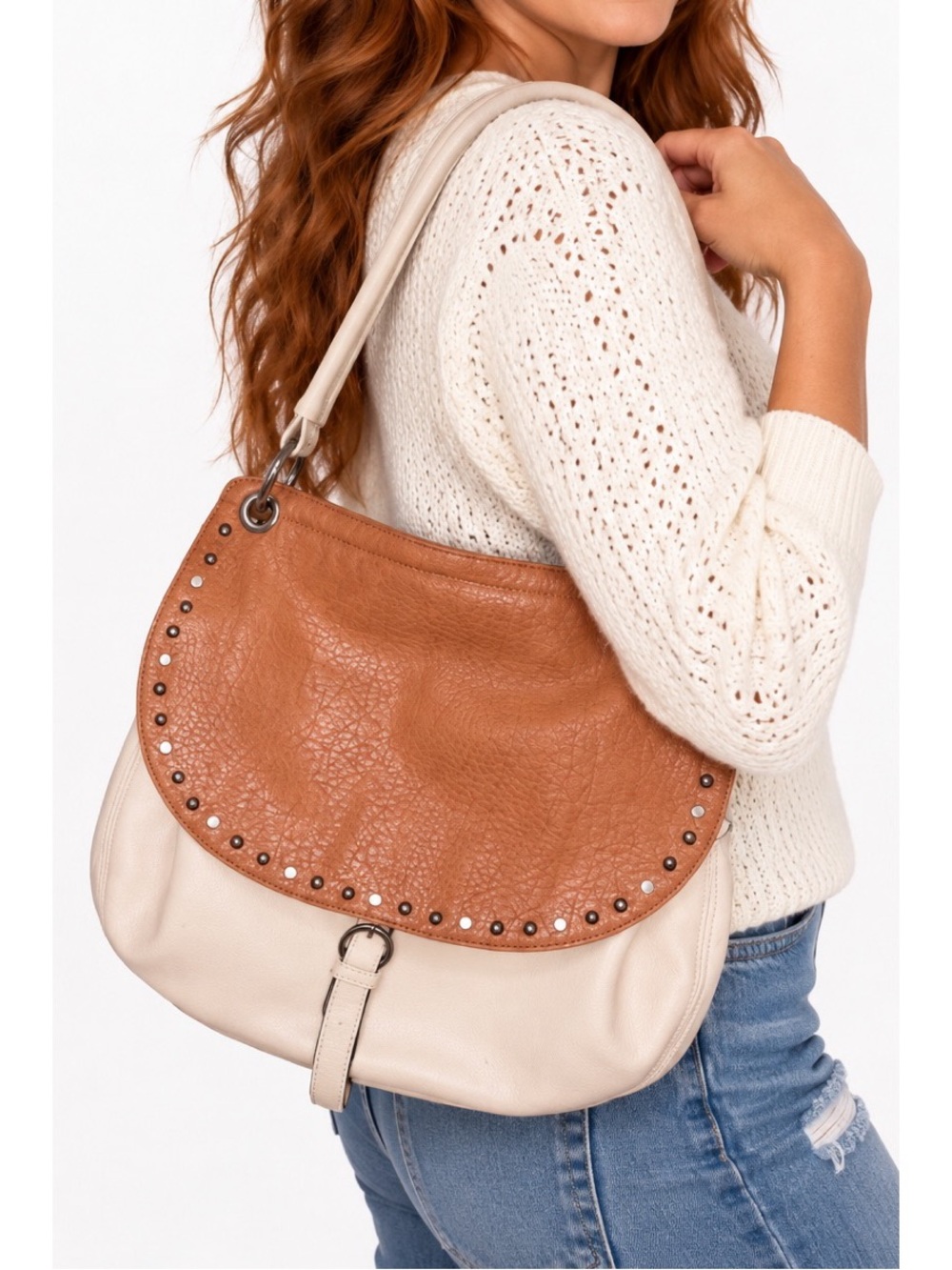 Two-tone shoulder bag featuring a warm cognac-brown front flap over a soft ivory